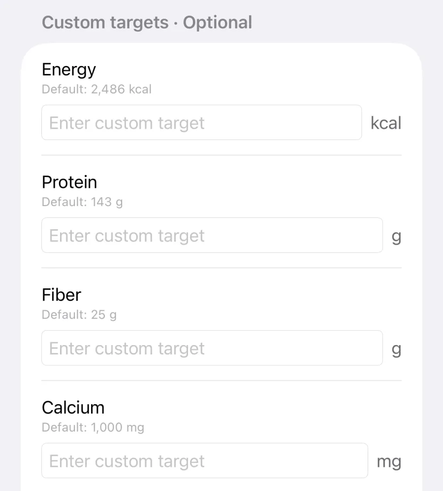 Daily targets sheet: optional custom targets for energy in kcal, protein and fiber in grams, calcium and iron in milligrams, each showing its default.